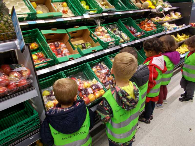 children visiting local shop